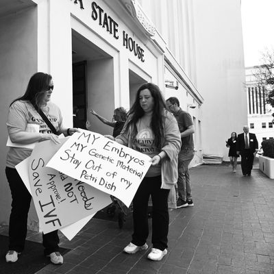 Supporters of legislation safeguarding IVF treatments hold a rally at the Alabama State House