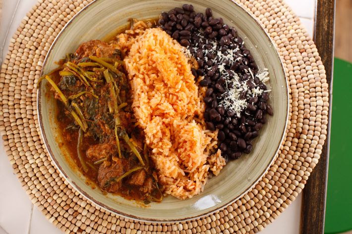 Costillas con verdolagas en salsa molcajete: pork ribs and purslane in Chavez's trademark salsa moljacete, which means mortar.