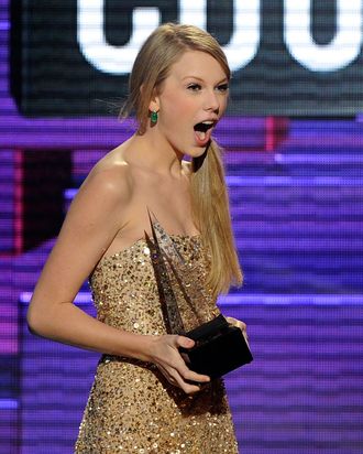 LOS ANGELES, CA - NOVEMBER 20: Singer Taylor Swift accepts Favorite Country Female Artist award onstage at the 2011 American Music Awards held at Nokia Theatre L.A. LIVE on November 20, 2011 in Los Angeles, California. (Photo by Kevork Djansezian/Getty Images)