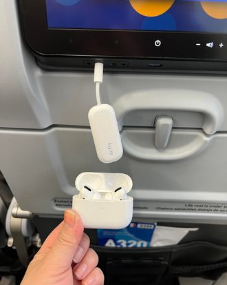 AirFly Bluetooth Headphone Adapter—This TikTok-Famous Gadget Can Connect  Your AirPods to the Airplane TV