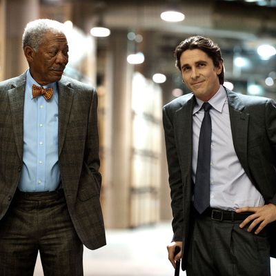 L-r: MORGAN FREEMAN as Lucius Fox and CHRISTIAN BALE as Bruce Wayne in Warner Bros. Pictures’ and Legendary Pictures’ action thriller “THE DARK KNIGHT RISES”