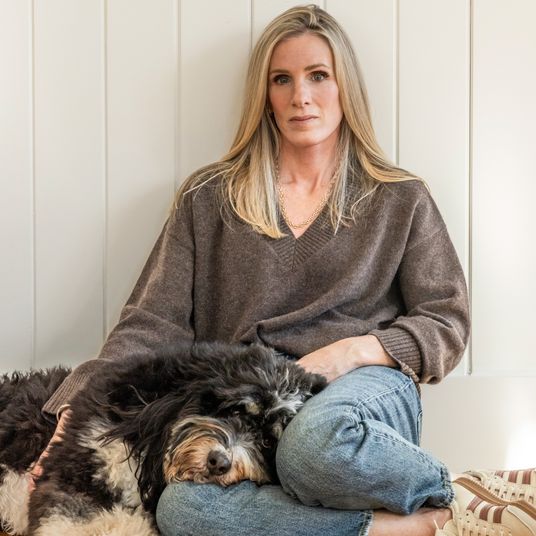 Kristin Cabot with her dog, Burt, at her home in Rye, N.H., Dec. 12, 2025. (Greta Rybus/The New York Times)