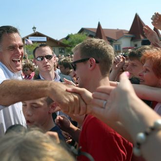 FRANKENMUTH, MI - JUNE 19: Republican presidential candidate, former Massachusetts Gov. Mitt Romney shakes hands with people during a campaign event in front of the Bavarian Inn Lodge on June 19, 2012 in Frankenmuth, Michigan. Mr. Romney is on the last day of a five day bus trip through battle ground states as he battles President Barack Obama for votes. (Photo by Joe Raedle/Getty Images)