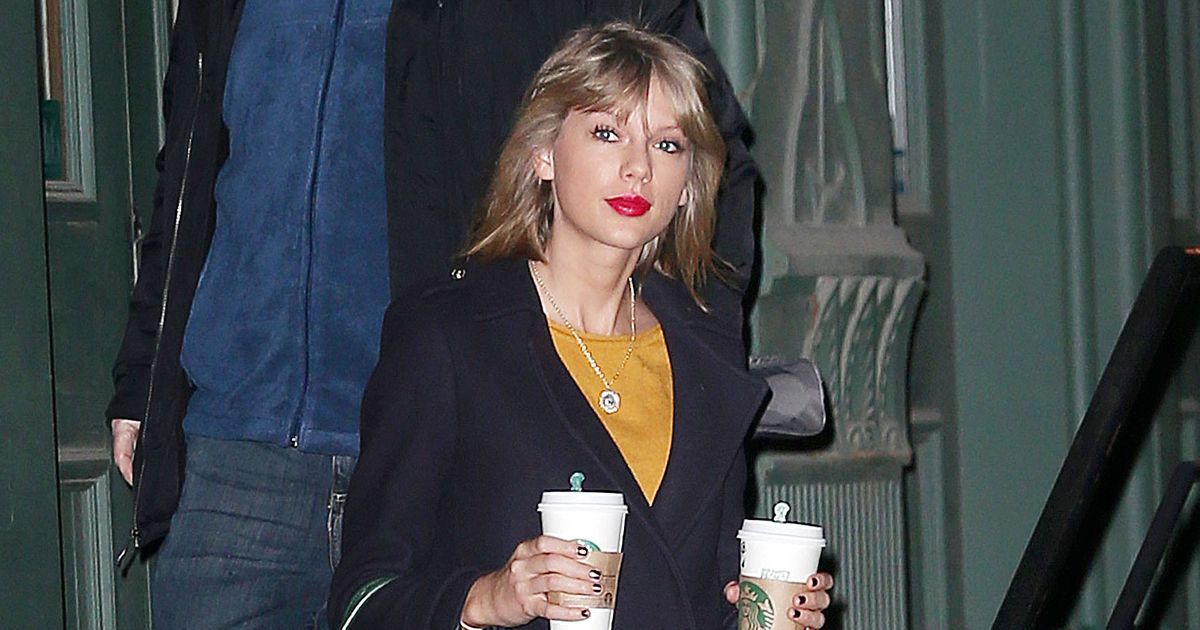 Taylor Swift Double-Fisted Starbucks in Pink Pants