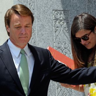 Former U.S. Sen. John Edwards holds the door for his daughter Cate Edwards as they leave for lunch on the ninth day of jury deliberations at federal court May 31, 2012 in Greensboro, North Carolina. Edwards, a former presidential candidate, plead not guilty to six counts of campaign finance violations and could face a maximum of 30 years in jail and $1.5 million in fines.
