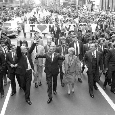 10/8/1984-New York, NY: Walking up Fifth Avenue 10/8 in the Columbus Day Parade are (left to right): Governor Mario Cuomo, Democratic Presidential Candidate Walter Mondale (c), his Vice-Presidential running mate Geraldine Ferraro and New York Governor Mario Cuomo.