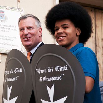 MATERA, ITALY - JULY 24: (L-R) New York City Mayor Bill de Blasio and son Dante de Blasio visit the house his grandmother was born in during a visit to Mayor de Blasio's grandmother's town on July 24, 2014 in Matera, Italy. The New York City mayor and his family are on an eight-day holiday in Italy but de Blasio has plans to meet with Italys foreign minister, Federica Mogherini, and with Cardinal Pietro Parolin, Vatican secretary of state. (Photo by Giovanni Marino/Getty Images)