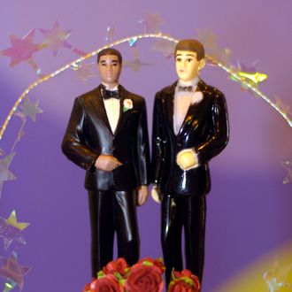 A wedding cake decoration featuring two men created by ZippyDogs, a promotional business, is on display at the Gay Wedding Show on April 17, 2004 in Seattle, Washington