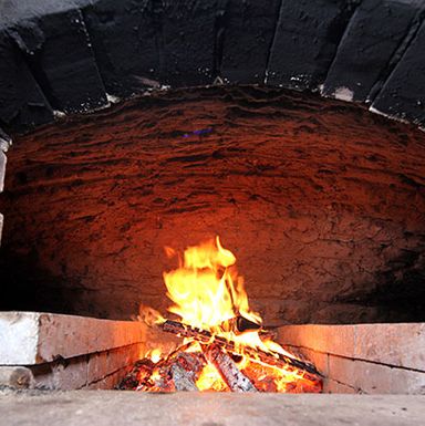 Maple, beech, and "fine-split" Vermont hardwood burns inside.