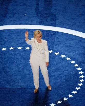Hillary Clinton in a white pantsuit.