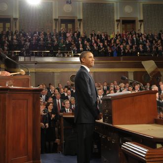 U.S. President Barack Obama acknowledges members of Congress before delivering his State of the Union address before a joint session of Congress on Capitol Hill January 24, 2012 .
