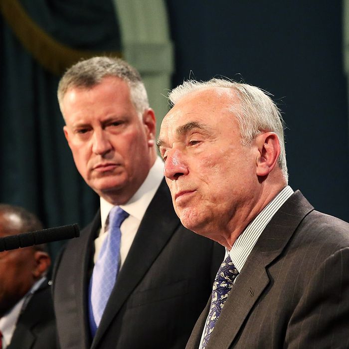 NEW YORK, NY - JULY 18: New York Mayor Bill de Blasio (center) and New York Police Commissioner William Bratton speak to the media at a news conference to address the recent death of a man in police custody on July 18, 2014 in New York City. The mayor has promised a full investigation into the circumstances surrounding the death of Eric Garner after he was taken into police custody in Staten Island yesterday. A 400-pound, 6-foot-4 asthmatic, Garner (43) died after police put him in a chokehold outside of a conveinence store for illegally selling cigarettes. (Photo by Spencer Platt/Getty Images)