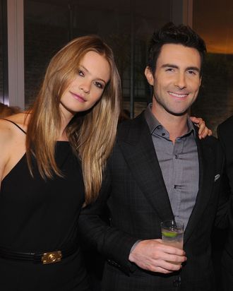 Behati Prinsloo and Adam Levine.