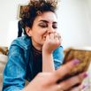 Young woman using phone