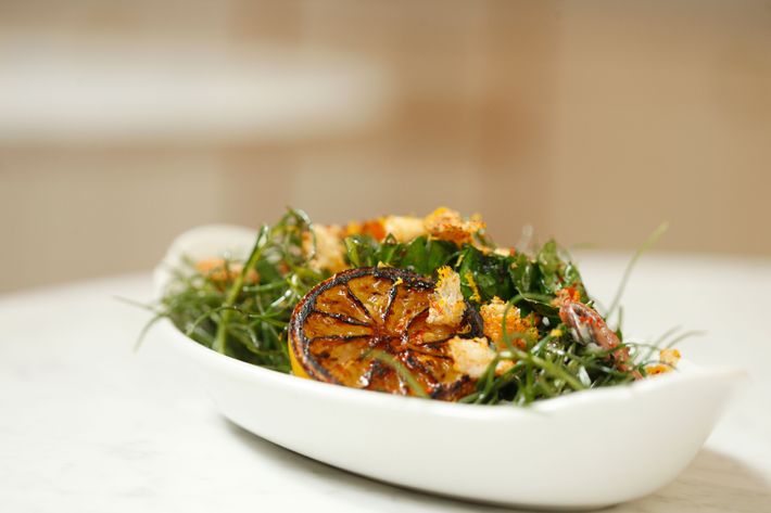 Agretti: sauteed agretti and wild spinach, garlic, anchovies, breadcrumbs.