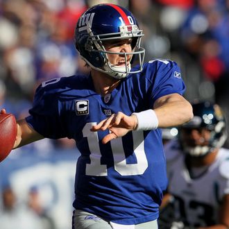 EAST RUTHERFORD, NJ - NOVEMBER 28: Eli Manning #10 of the New York Giants throws a pass against the Jacksonville Jaguars at New Meadowlands Stadium on November 28, 2010 in East Rutherford, New Jersey. (Photo by Chris McGrath/Getty Images) *** Local Caption *** Eli Manning