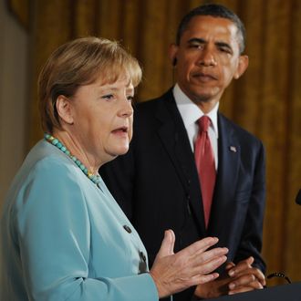 US President Barack Obama and German Chancellor Angela Merkel hold a joint press conference in the East Room of the White House in Washington, DC, June 7, 2011, as part of an official visit. AFP PHOTO / Saul LOEB (Photo credit should read SAUL LOEB/AFP/Getty Images)