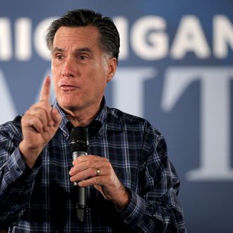 TROY, MI - NOVEMBER 10: Republican presidential candidate and former Massachusetts Governor Mitt Romney speaks to supporters during a rally at the American Polish Cultural Center on November 10, 2011 in Troy, Michigan. On Wednesday Romney squared off against the seven other leading GOP presidential candidates during a debate at Oakland University in Rochester, Michigan. (Photo by Scott Olson/Getty Images)