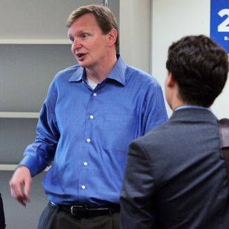 Jim Messina (C), campaign manager for the re-election of U.S. President Barack Obama, talks with reporters during a tour of the re-election headquarters May 12, 2010 in Chicago. The office occupies a reported 50, 000 square feet of the Prudential Plaza office building, one block south of Obama's 2008 campaign headquarters. 