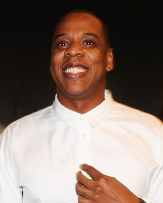  Musician Jay-Z arrives in the F1 paddock following practice for the Abu Dhabi Formula One Grand Prix at the Yas Marina Circuit on November 1, 2013 in Abu Dhabi, United Arab Emirates. 