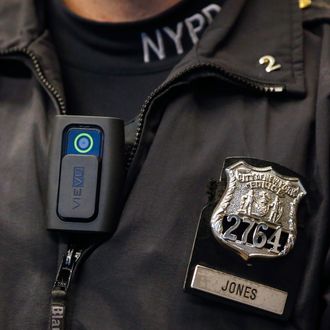  A police body camera is seen on an officer during a news conference on the pilot program involving 60 NYPD officers dubbed 'Big Brother' at the NYPD police academy in the Queens borough of New York, December 3, 2014. 