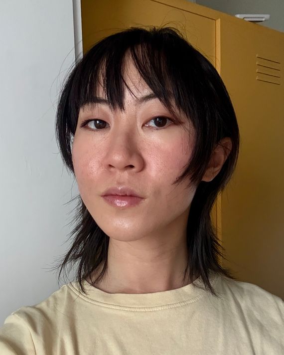 Selfie of the author with flat, straight, textureless hair.