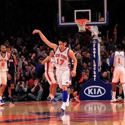 Jeremy Lin #17 of the New York Knicks reacts after scoring a three-pointer against the Atlanta Hawks at Madison Square Garden on February 22, 2012 in New York City.