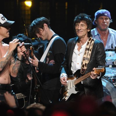 CLEVELAND, OH - APRIL 14: (L-R) Inductees Anthony Kiedis, Josh Klinghoffer, Ron Wood and Chad Smith Josh Klinghofferonstage during the 27th Annual Rock And Roll Hall of Fame Induction Ceremony at Public Hall on April 14, 2012 in Cleveland, Ohio. (Photo by Michael Loccisano/Getty Images)