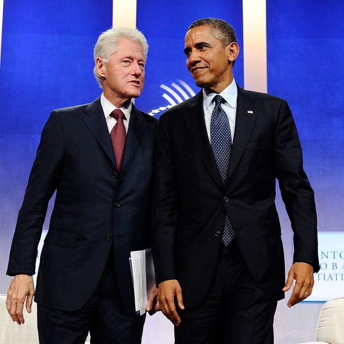 US President Barack Obama and former president Bill Clinton leave after participating in a conversation about the future of health care reform in America, and the benefits of expanding access to quality health care around the globe at Clinton Global Initiative in New York on September 24, 2013.