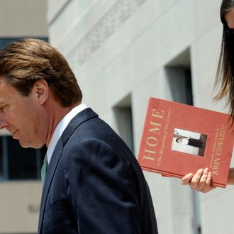 Former U.S. Sen. John Edwards and his daughter Cate Edwards leave for lunch on the ninth day of jury deliberations at federal court May 31, 2012 in Greensboro, North Carolina. Edwards, a former presidential candidate, plead not guilty to six counts of campaign finance violations and could face a maximum of 30 years in jail and $1.5 million in fines.