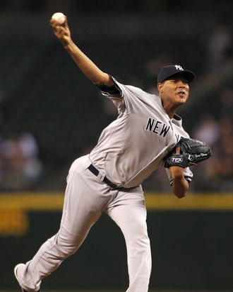 SEATTLE - SEPTEMBER 14: Starting pitcher Ivan Nova #47 of the New York Yankees pitches against the Seattle Mariners at Safeco Field on September 14, 2011 in Seattle, Washington. (Photo by Otto Greule Jr/Getty Images)