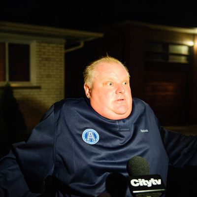 Toronto, Canada. 2nd May 2012 -- File image: Toronto Mayor Rob Ford addresses the media after confronting an intruder at his home. Ford has suffered a major court ruling, which has ejected him from office for conflict of interest. -- File images: A Provincial Court ruling determining that Toronto Mayor Rob Ford was in conflict of interest and has resulted in his ejection from office. Ford has requested a 14-day stay to launch his appeal. File images from May and July 2012.