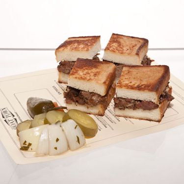 Smoked goat meat on Texas toast.