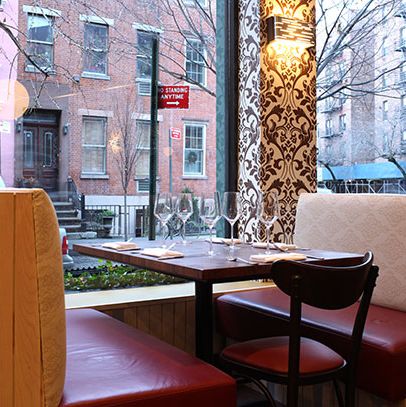 The restaurant's signature cocktail is made with Bitter Truth Pink Gin, lemon, sage, and Blanc de Blancs.