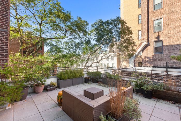 A Prospect Park West Townhouse With a Driveway and Garage