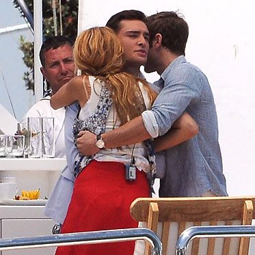And lo, because Serena always gets her way, Chuck appears. Hugs all around before Chuck pulls back and disparages Nate and Serena for engaging in anything that could be mistaken for something as declasse as a three-way kiss. He follows that up with a pervy remark about how he really prefers his three-ways.