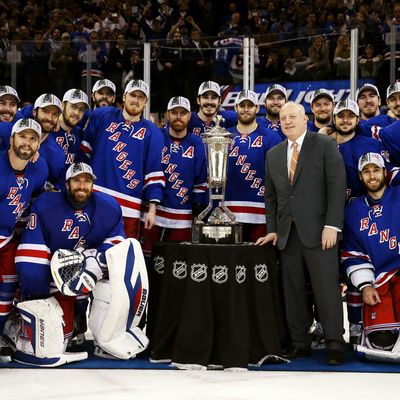 The New York Rangers pose with Deputy Commissioner Bill Daly and the Prince of Wales Trophy after defeating the Montreal Canadiens in Game Six to win the Eastern Conference Final in the 2014 NHL Stanley Cup Playoffs at Madison Square Garden on May 29, 2014 in New York City. The New York Rangers defeated the Montreal Canadiens 1 to 0. 