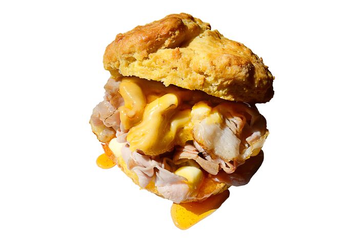 Ham-and-cheese biscuit with housemade ham, L'Amuse Gouda, and Mike's Hot Honey.