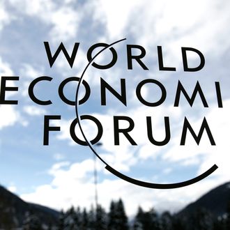 The World Economic Forum's (WEF) logo is displayed on a window inside the Congress Center ahead of the meeting in Davos, Switzerland, on Sunday, Jan. 19, 2014.