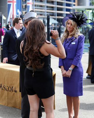 This woman got a fascinator, pashmina, <em>and</em> tie.