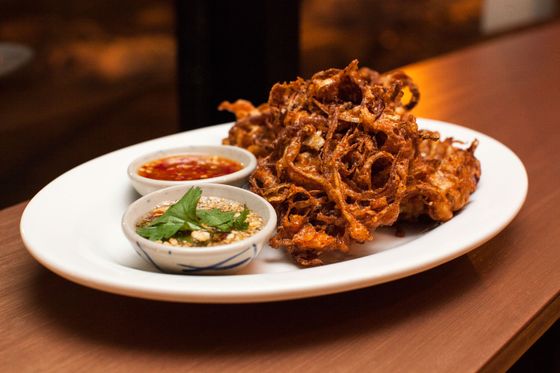 Krabong Hua Plee: banana-blossom fritters with spicy garlic-lime sauce and sweet peanut-chile sauce.