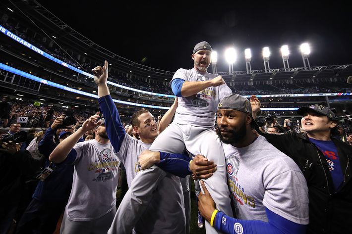 Photos of the Chicago Cubs Hugging After World Series Win