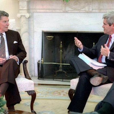 5/20/1985 President Reagan and Newt Gingrich in the Oval Office during a Meeting with the 