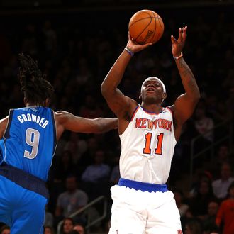 Ronnie Brewer #11 of the New York Knicks takes a shot as Jae Crowder #9 of the Dallas Mavericks defends on November 9, 2012 at Madison Square Garden in New York City.The New York Knicks defeated the Dallas Mavericks 104-94.