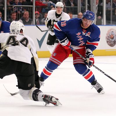 Brad Richards #19 of the New York Rangers shoots to score his goal in the second period against Brooks Orpik #44 of the Pittsburgh Penguin.