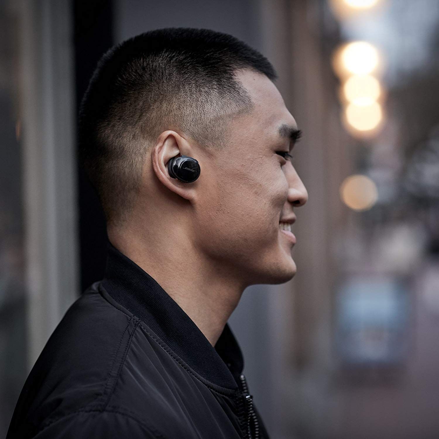 beats wireless earbuds on person