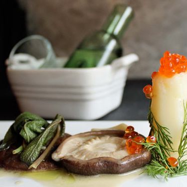 Mini-bottle of vodka paired with sage-butter poached shitake mushrooms with garlic, poached dill potato, and salmon roe.