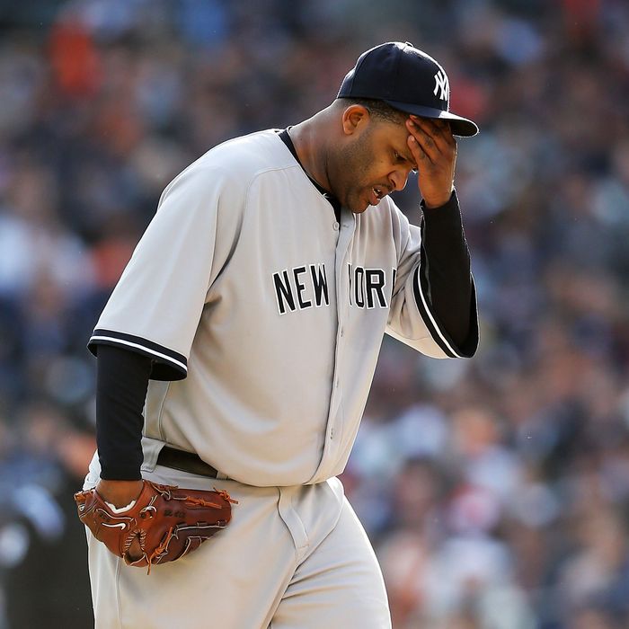 DETROIT, MI - OCTOBER 18: CC Sabathia #52 of the New York Yankees wipes his forehead with his hand against the Detroit Tigers during game four of the American League Championship Series at Comerica Park on October 18, 2012 in Detroit, Michigan. (Photo by Leon Halip/Getty Images)