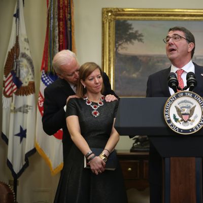 WASHINGTON, DC - FEBRUARY 17: Ashton Carter (R) makes remarks after he was sworn in as U.S. Secretary of Defense as his wife Stephanie (2nd L) Vice President Joe Biden (L) listen February 17, 2015 in the Roosevelt Room of the White House in Washington, DC. Carter has become the 25th U.S. Secretary of Defense. (Photo by Alex Wong/Getty Images)