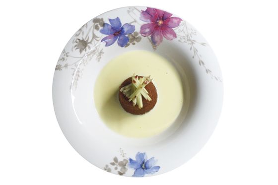 Steamed pudding cake with warm vanilla anglaise and shredded apple.